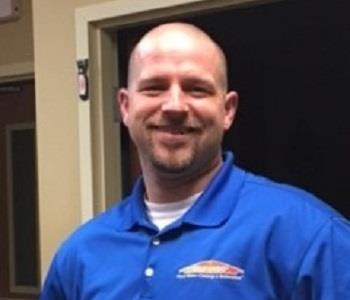 Jeff Simmons in blue SERVPRO shirt