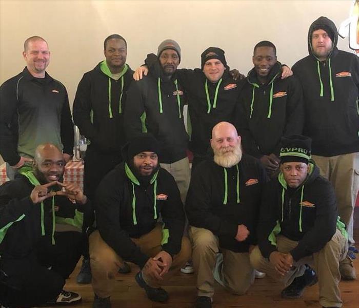 10 Men dressed in SERVPRO uniform